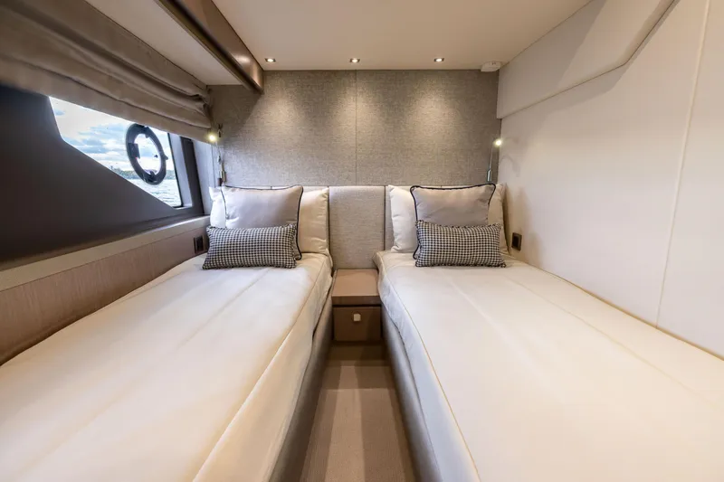 Slide: The Image of Luxurious twin cabin interior on 2018 Sunseeker Manhattan 52 yacht. - 48