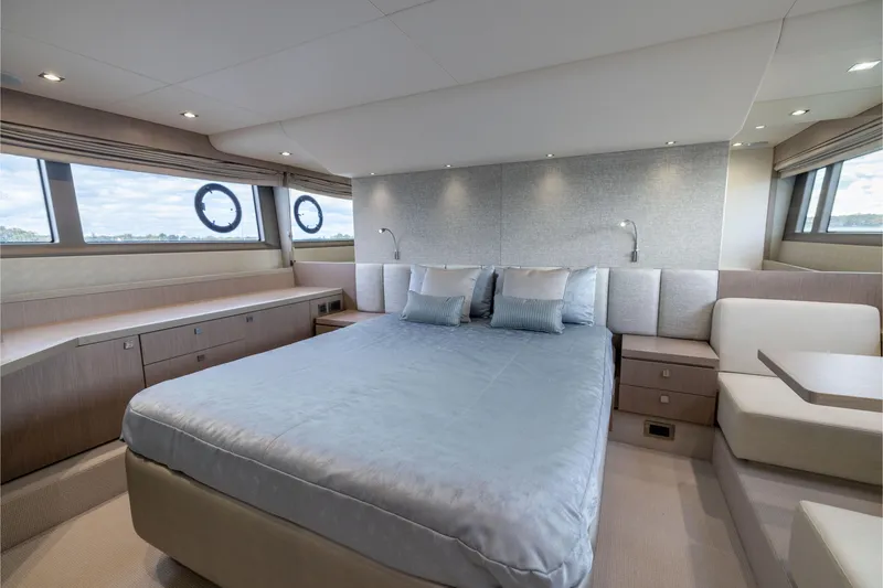 Slide: The Image of Luxurious bedroom interior of 2018 Sunseeker Manhattan 52 yacht with elegant furnishings. - 53