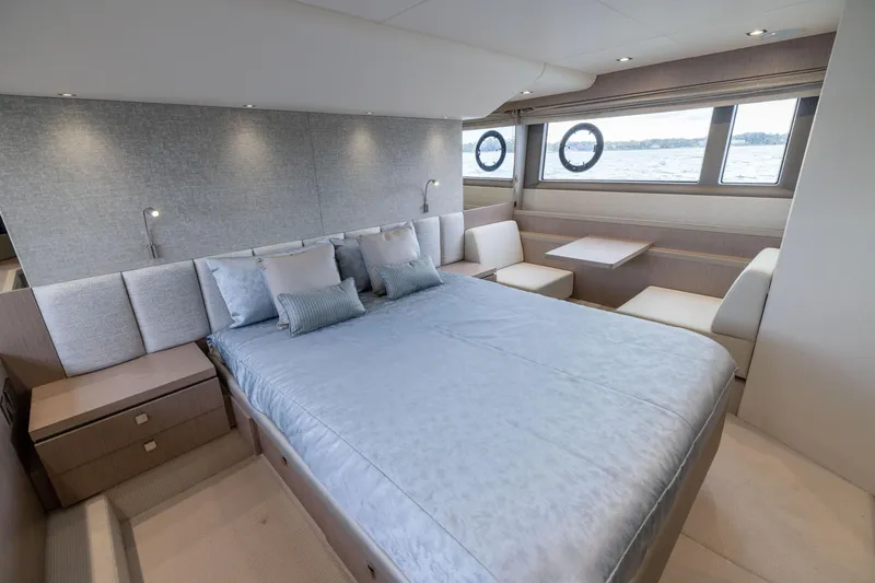 Slide: The Image of Luxurious bedroom interior of 2018 Sunseeker Manhattan 52 yacht with elegant furnishings. - 54