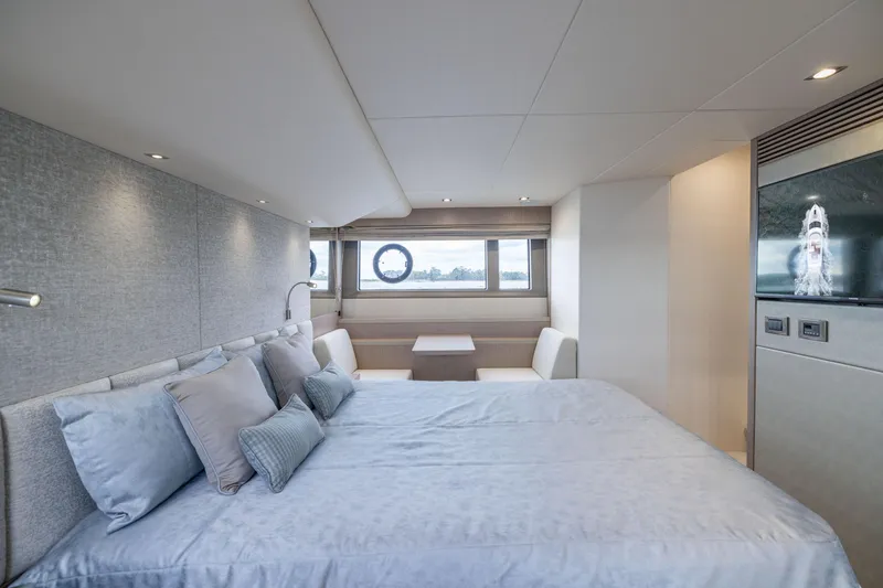 Slide: The Image of Luxurious interior of 2018 Sunseeker Manhattan 52 yacht with elegant bedroom and seating area. - 55