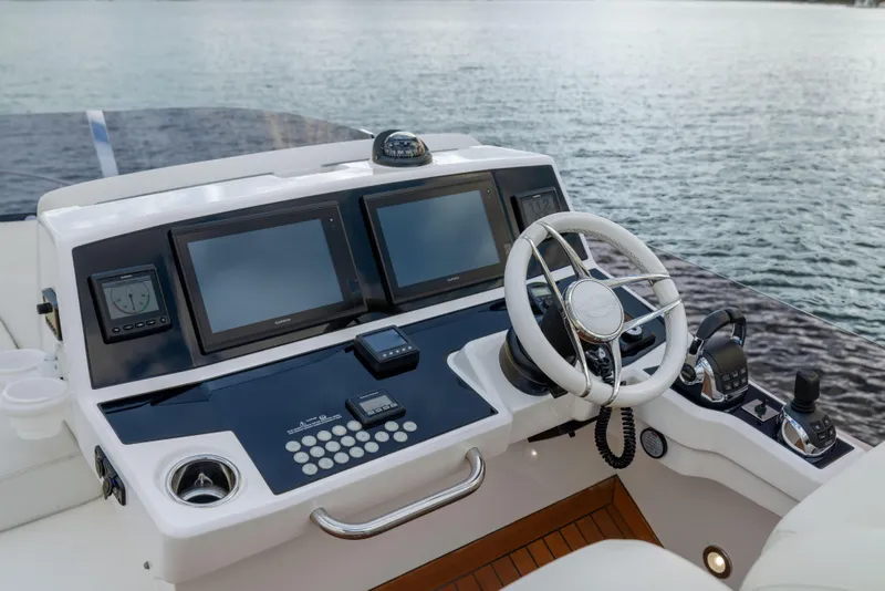 Slide: The Image of Cockpit of 2018 Sunseeker Manhattan 52 yacht with modern navigation controls. - 71