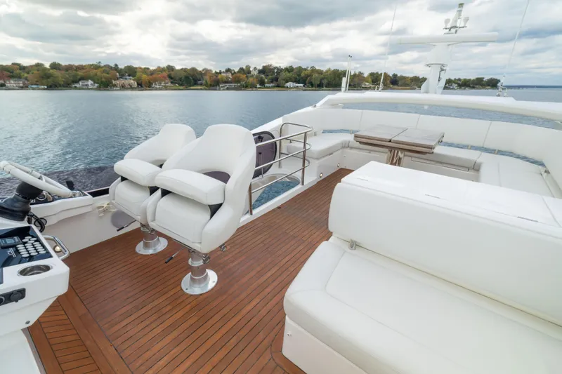 Slide: The Image of Luxurious 2018 Sunseeker Manhattan 52 yacht with spacious deck and seating area. - 73