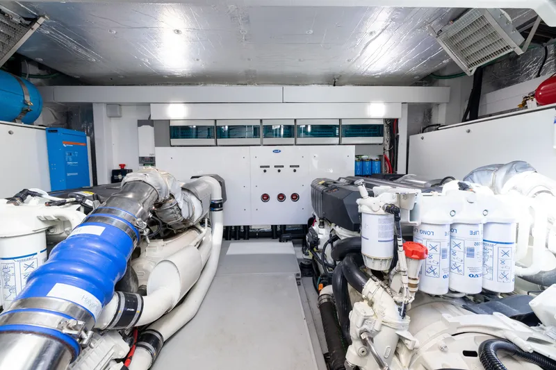 Slide: The Image of Engine room of 2018 Sunseeker Manhattan 52 yacht, showcasing advanced machinery and equipment. - 77
