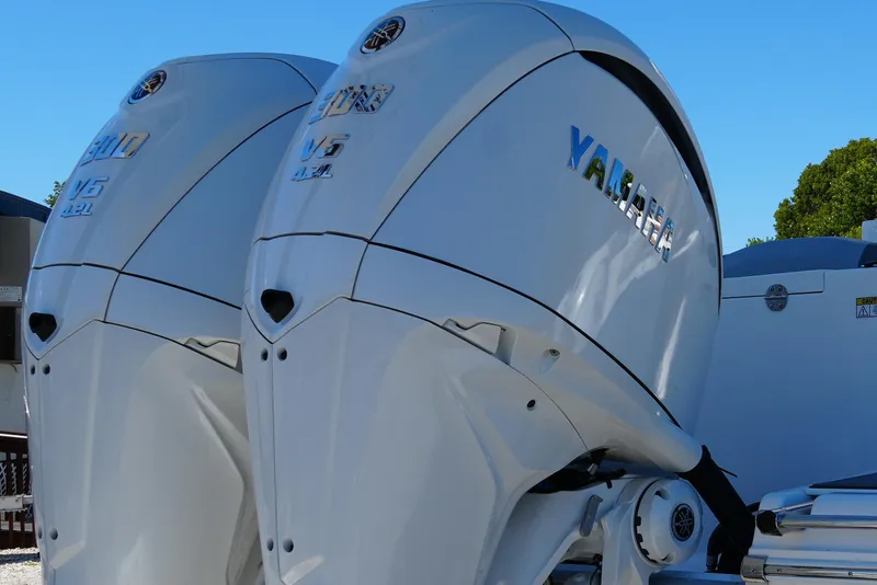 Slide: The Image of Twin Yamaha V6 outboard engines on a 2025 NauticStar 292 Legacy boat. - 8