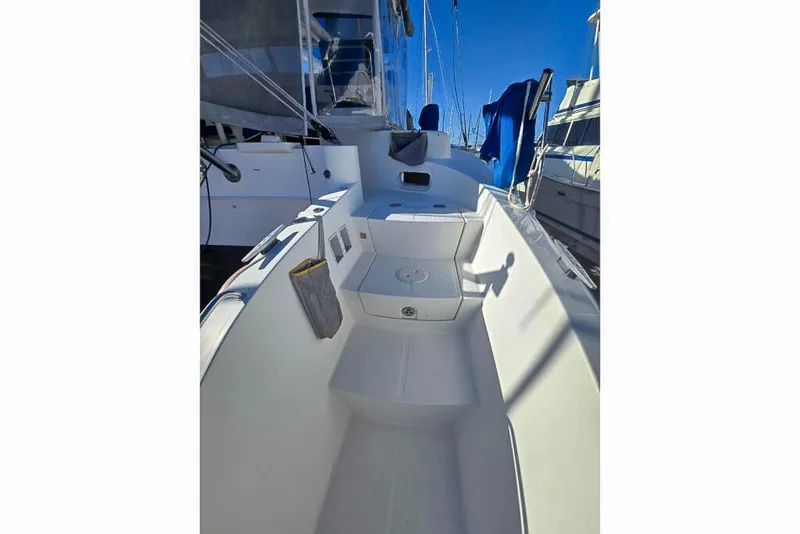 Slide: The Image of Spacious deck of 2006 Dolphin 460 sailboat, featuring sleek design and modern amenities. - 10