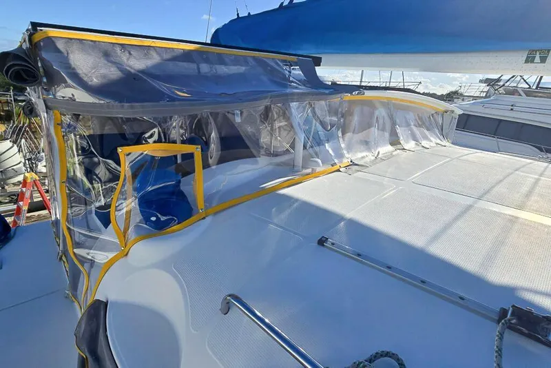 Slide: The Image of Sailboat Dolphin 460, 2006 model, featuring a clear canopy and spacious deck. - 22