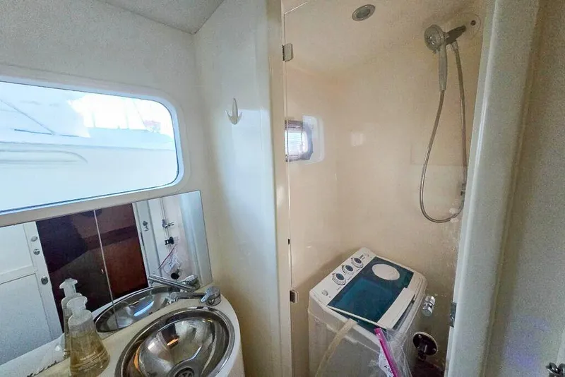 Slide: The Image of Bathroom interior of 2006 Dolphin 460 yacht with shower and sink. - 53