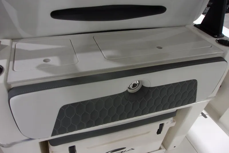 Slide: The Image of 2026 Cobia 305 Center Console boat interior storage compartment. - 15