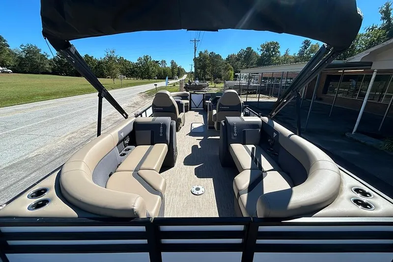 Slide: The Image of 2025 Viaggio Lago X-Q pontoon boat with spacious seating and canopy on a sunny day. - 10