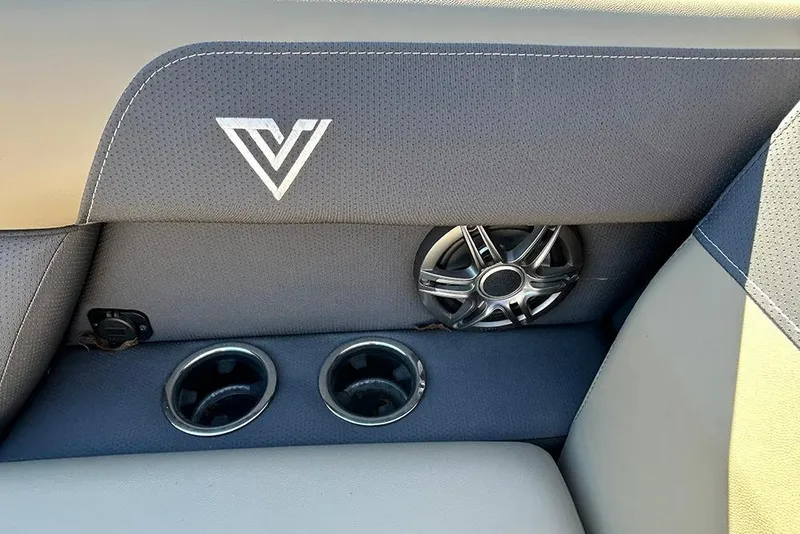 Slide: The Image of Viaggio Lago X-Q 2025 interior with speaker and cup holders, featuring stylish upholstery. - 17