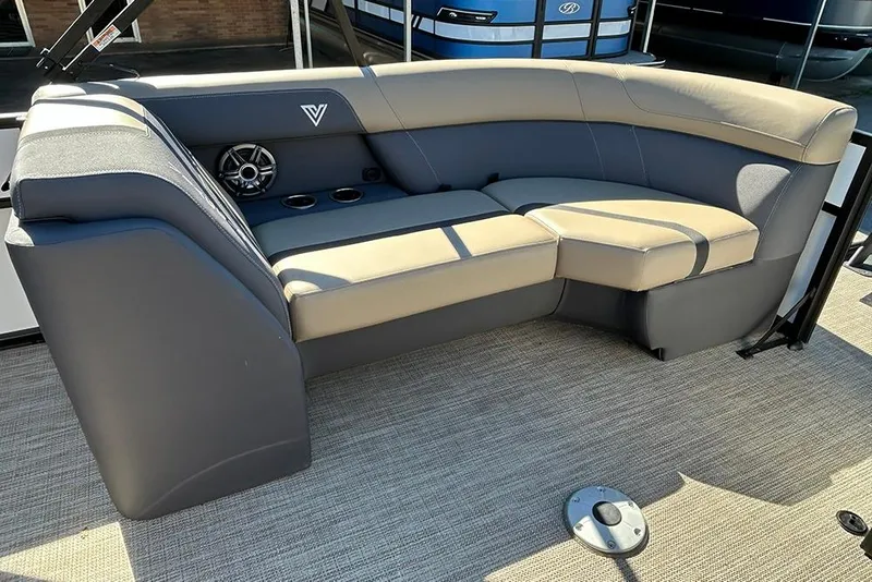 Slide: The Image of Luxurious seating on 2025 Viaggio Lago X-Q boat with cup holders and speaker. - 18
