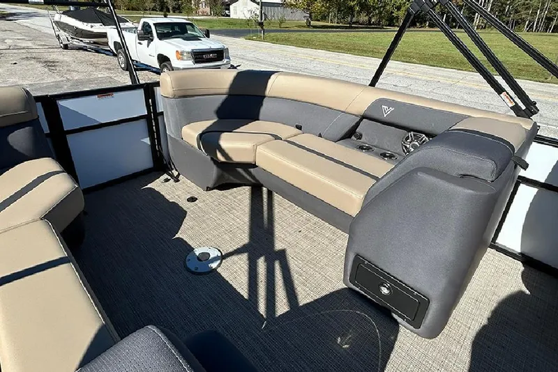 Slide: The Image of Interior of 2025 Viaggio Lago X-Q pontoon boat with beige and gray seating. - 25