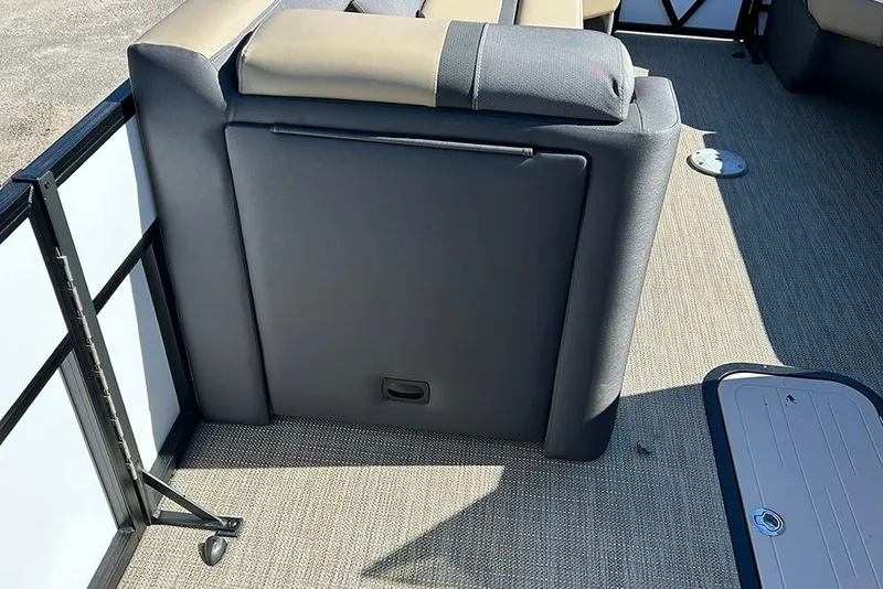 Slide: The Image of Viaggio Lago X-Q 2025 boat interior with cushioned seating and carpeted flooring. - 28