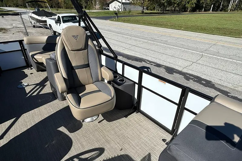 Slide: The Image of 2025 Viaggio Lago X-Q boat interior with luxurious seating and cup holder. - 34