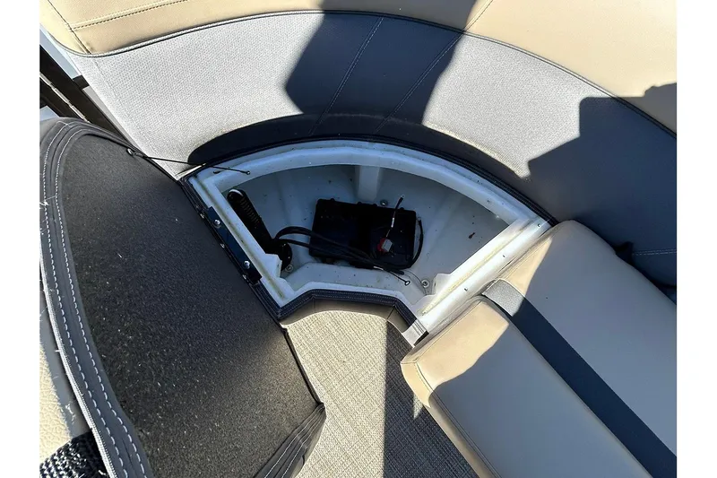 Slide: The Image of Open storage compartment in 2025 Viaggio Lago X-Q boat, showcasing interior details and seating. - 35