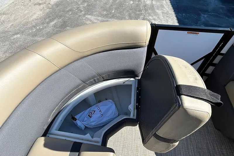 Slide: The Image of Viaggio Lago X-Q 2025 boat seat storage with beige and gray upholstery. - 42