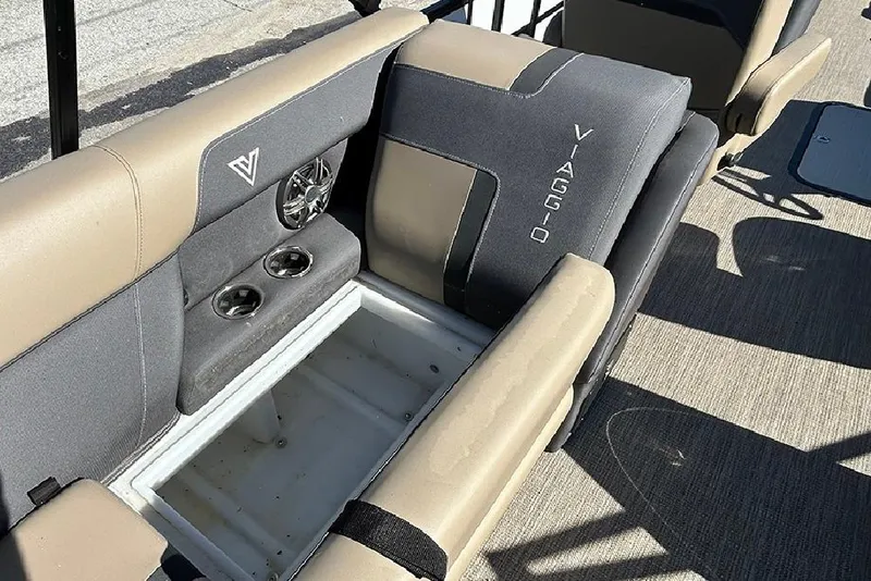 Slide: The Image of Viaggio Lago X-Q 2025 boat interior with storage compartment and cup holders. - 44