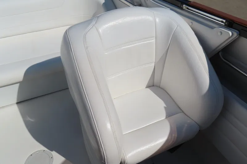 Slide: The Image of White leather seat on 1990 Wellcraft 38 Scarab boat interior. - 14