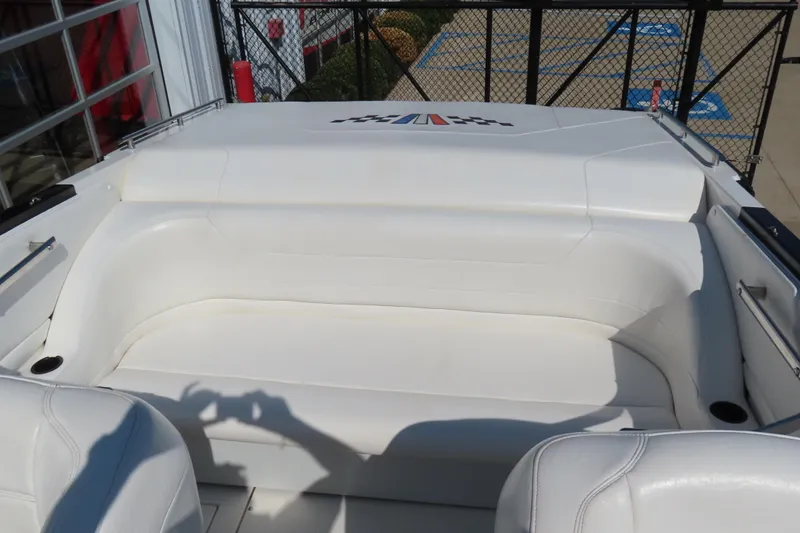 Slide: The Image of 1990 Wellcraft 38 Scarab boat interior with white seating and sleek design. - 16