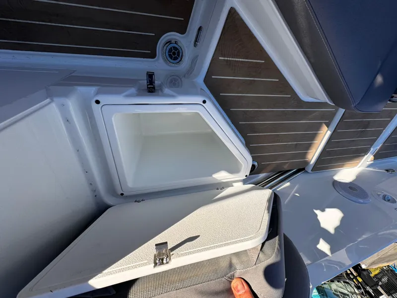 Slide: The Image of Yamarin 80DC 2025 model boat interior with open storage compartment. - 12