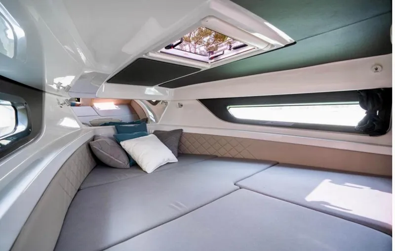Slide: The Image of Luxurious interior cabin of 2025 Yamarin 80DC boat with comfortable bedding. - 17