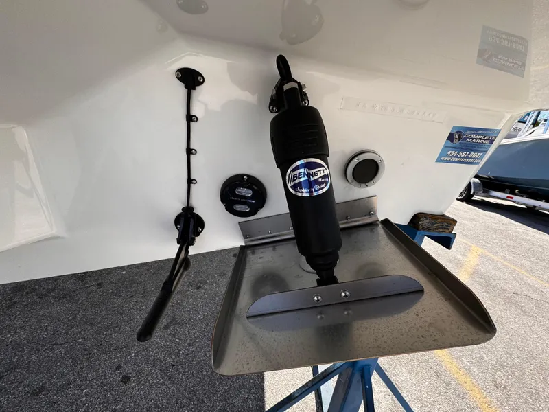 Slide: The Image of 2025 Yamarin 80DC boat with trim tab and marine equipment. - 25