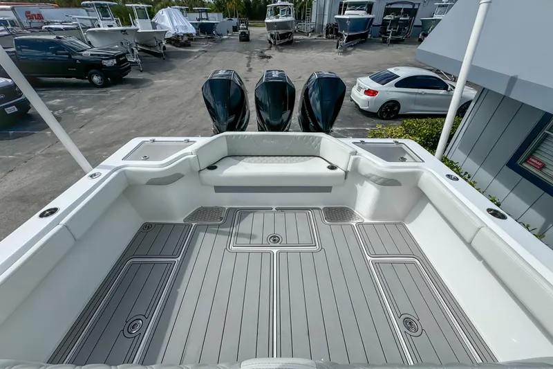 Slide: The Image of 2023 Front Runner 36 Center Console boat with spacious deck and triple engines. - 26