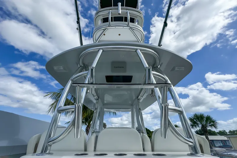 Slide: The Image of 2023 Front Runner 36 Center Console boat with sleek design against a cloudy sky. - 28