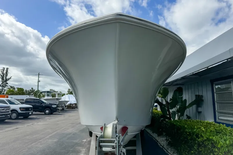 Slide: The Image of 2023 Front Runner 36 Center Console boat on trailer, outdoor dealership setting. - 3