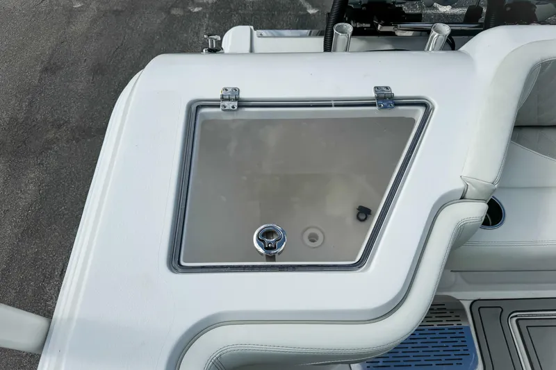 Slide: The Image of 2023 Front Runner 36 Center Console boat detail with storage compartment and latch. - 32