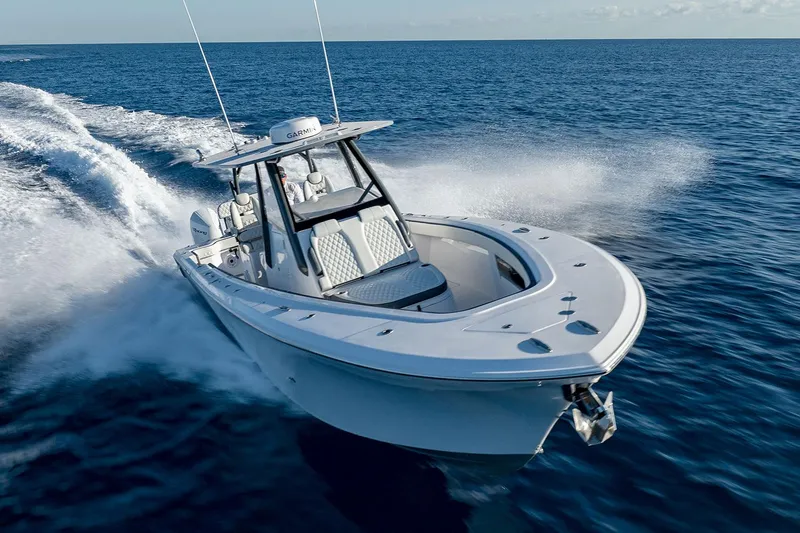 Slide: The Image of Manufacturer Provided Image: 2023 Front Runner 36 Center Console boat cruising on open ocean waters. - 41