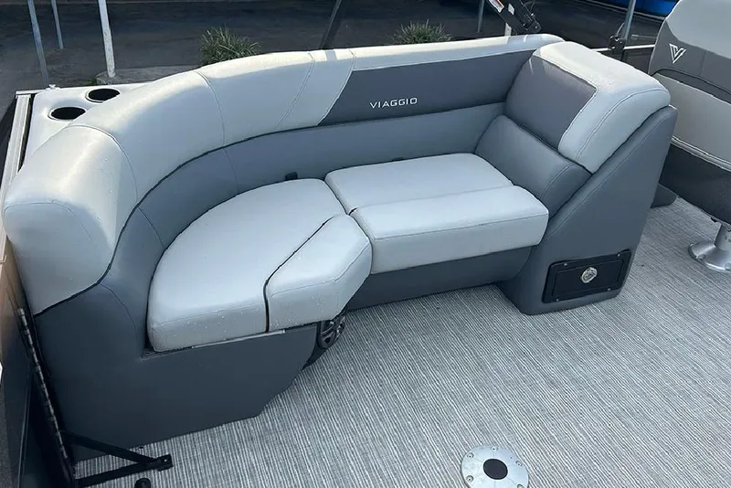 Slide: The Image of Luxurious seating on 2025 Viaggio Lago V-U boat, featuring sleek gray upholstery. - 13
