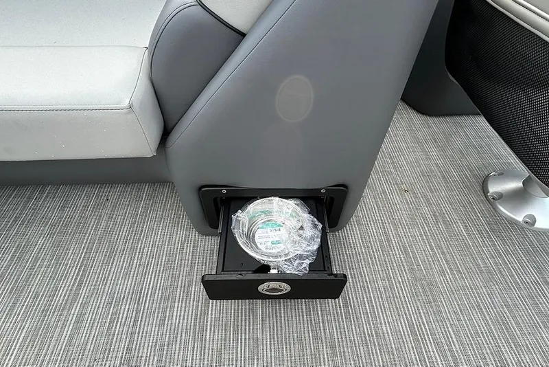 Slide: The Image of 2025 Viaggio Lago V-U boat interior with storage drawer and seating. - 16