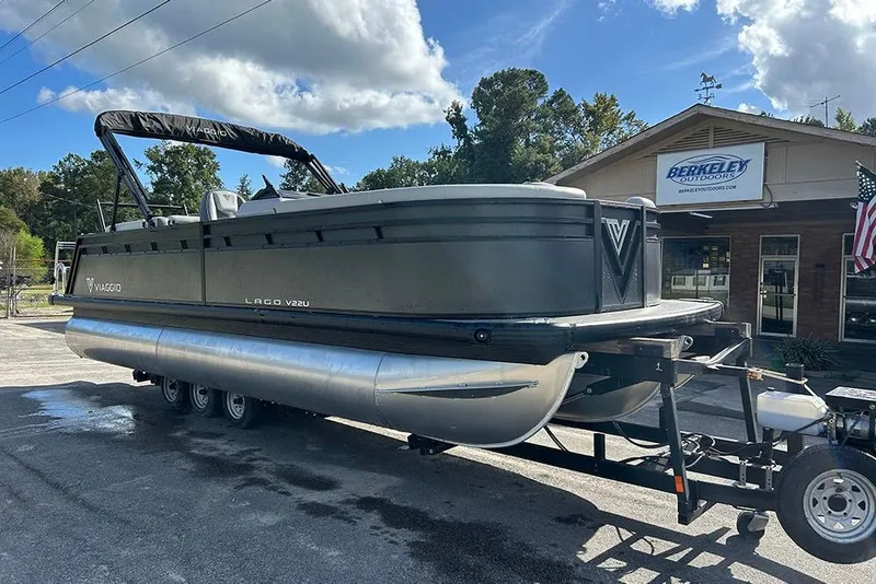 Slide: The Image of 2025 Viaggio Lago V-U pontoon boat on trailer at Berkeley Outdoors dealership. - 4