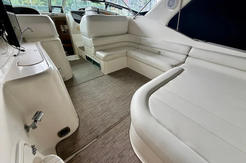 Slide: The Image of Interior of 1999 Wellcraft 45 Excalibur boat with white leather seating. - 15