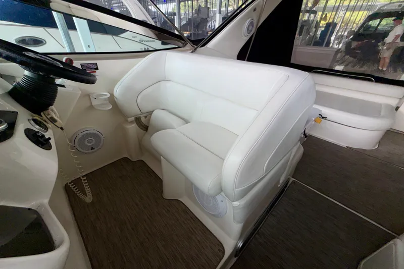 Slide: The Image of Interior of 1999 Wellcraft 45 Excalibur boat with white seating and modern design. - 18