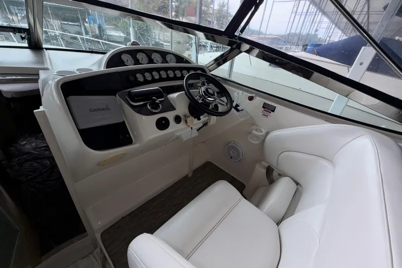 Slide: The Image of Joystick controls on a 1999 Wellcraft 45 Excalibur boat with carbon fiber panel. - 21