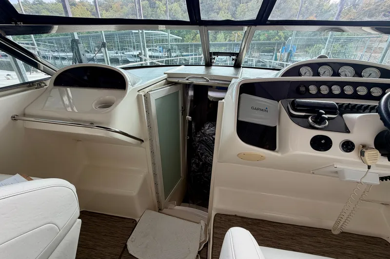 Slide: The Image of Interior of 1999 Wellcraft 45 Excalibur yacht with plush seating and modern amenities. - 25