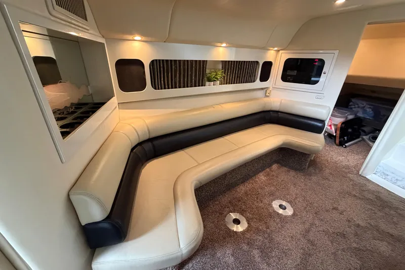 Slide: The Image of Luxurious interior of 1999 Wellcraft 45 Excalibur yacht with plush seating and modern amenities. - 27