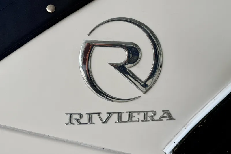 Slide: The Image of Logo of Riviera on a 1999 Wellcraft 45 Excalibur boat. - 3