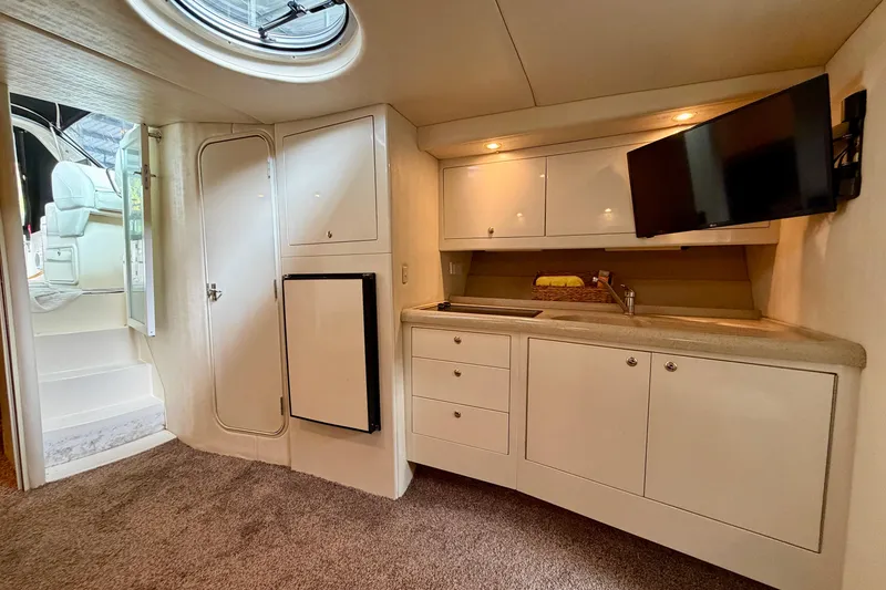 Slide: The Image of Bathroom interior of 1999 Wellcraft 45 Excalibur boat with shower and sink. - 30