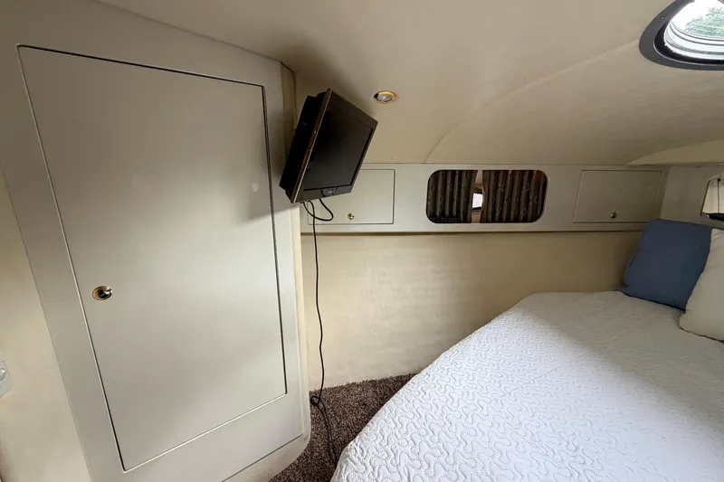 Slide: The Image of Interior of 1999 Wellcraft 45 Excalibur boat with elegant seating and lighting. - 34