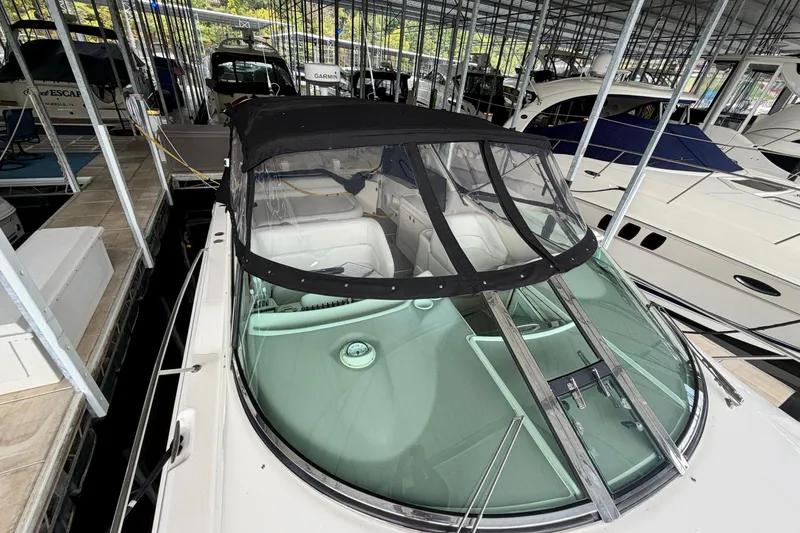 Slide: The Image of 1999 Wellcraft 45 Excalibur boat with "ANONYMVS" name, docked in Scottsdale, AZ. - 9