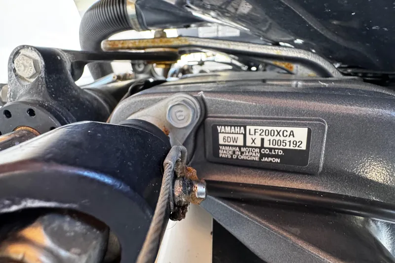 Slide: The Image of Close-up of Yamaha LF200XCA engine on 2019 Robalo R272 Center Console boat. - 15