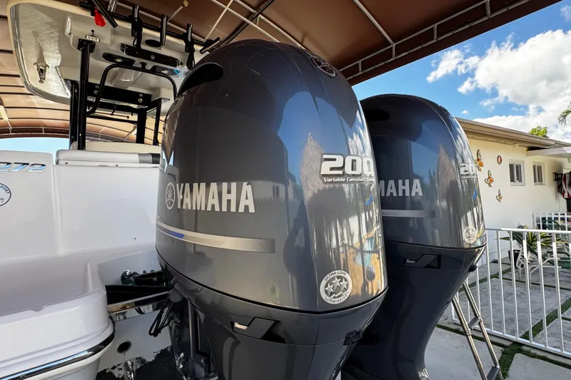 Slide: The Image of 2019 Robalo R272 Center Console with twin Yamaha 200 engines. - 16