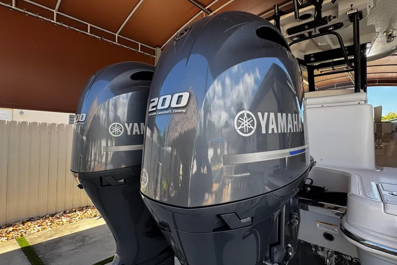 Slide: The Image of Twin Yamaha 200 engines on 2019 Robalo R272 Center Console boat. - 17