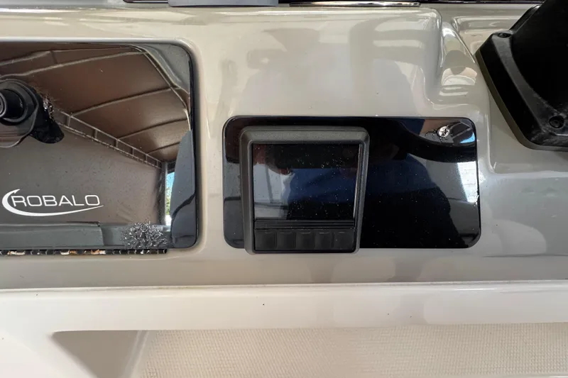 Slide: The Image of Control panel of 2019 Robalo R272 Center Console boat with logo. - 37