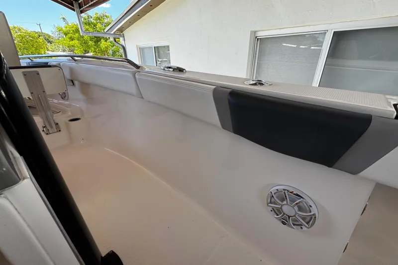 Slide: The Image of 2019 Robalo R272 Center Console boat interior with speaker and cushioned seating. - 43