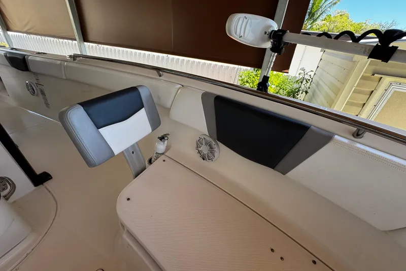 Slide: The Image of 2019 Robalo R272 Center Console boat interior with seating and speaker. - 57