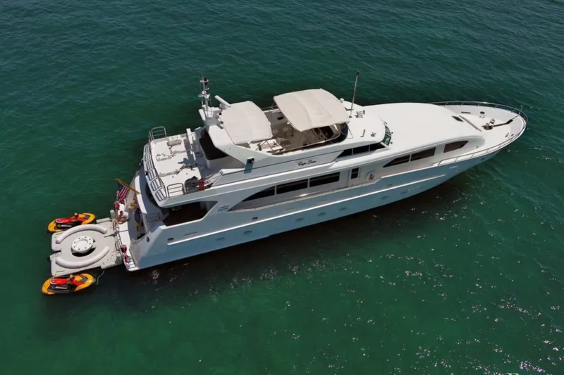 The Image of Luxury 2001 Intermarine RPH 95 yacht on open water under clear blue sky. - 0